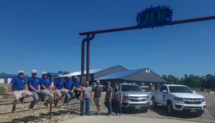 Full JLB Foundation Repair team with service vehicles in Johnson County